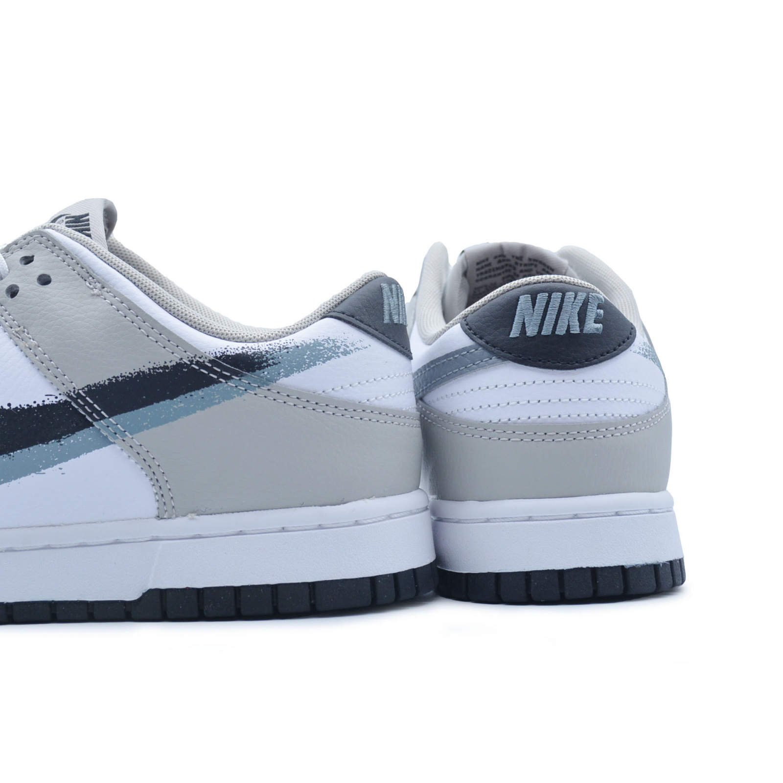 nike dunk low "stencil swoosh"